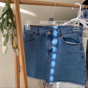 Denim mini skirt from Brandy Melville. Would best fit a size xs or 23/24.